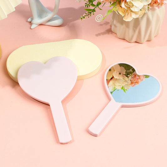 Pink handheld makeup mirror and pink comb GG001